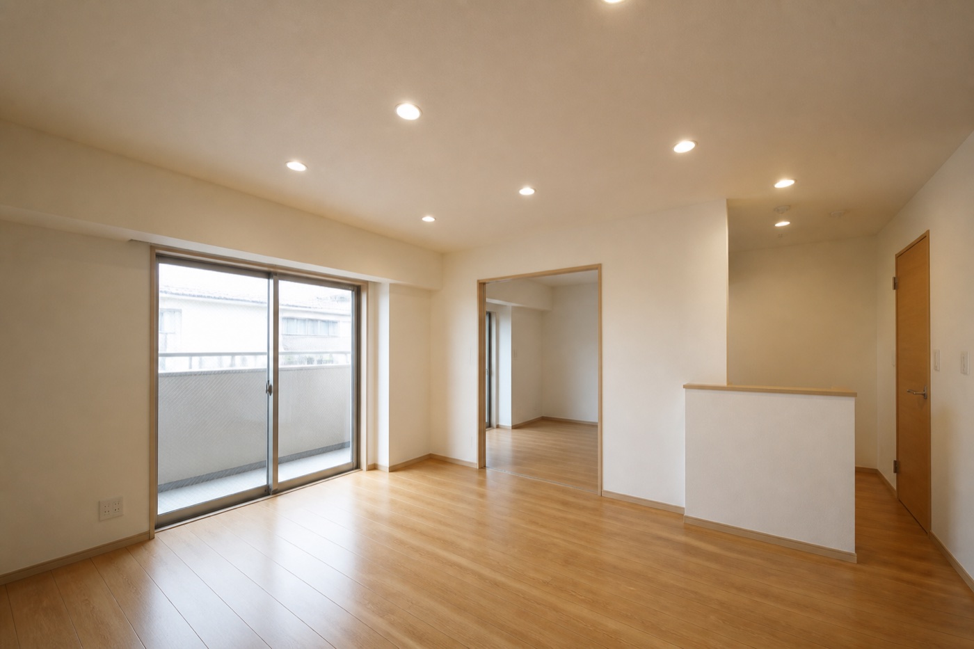 天井照明をダウンライトへ更新した賃貸マンションのリビング